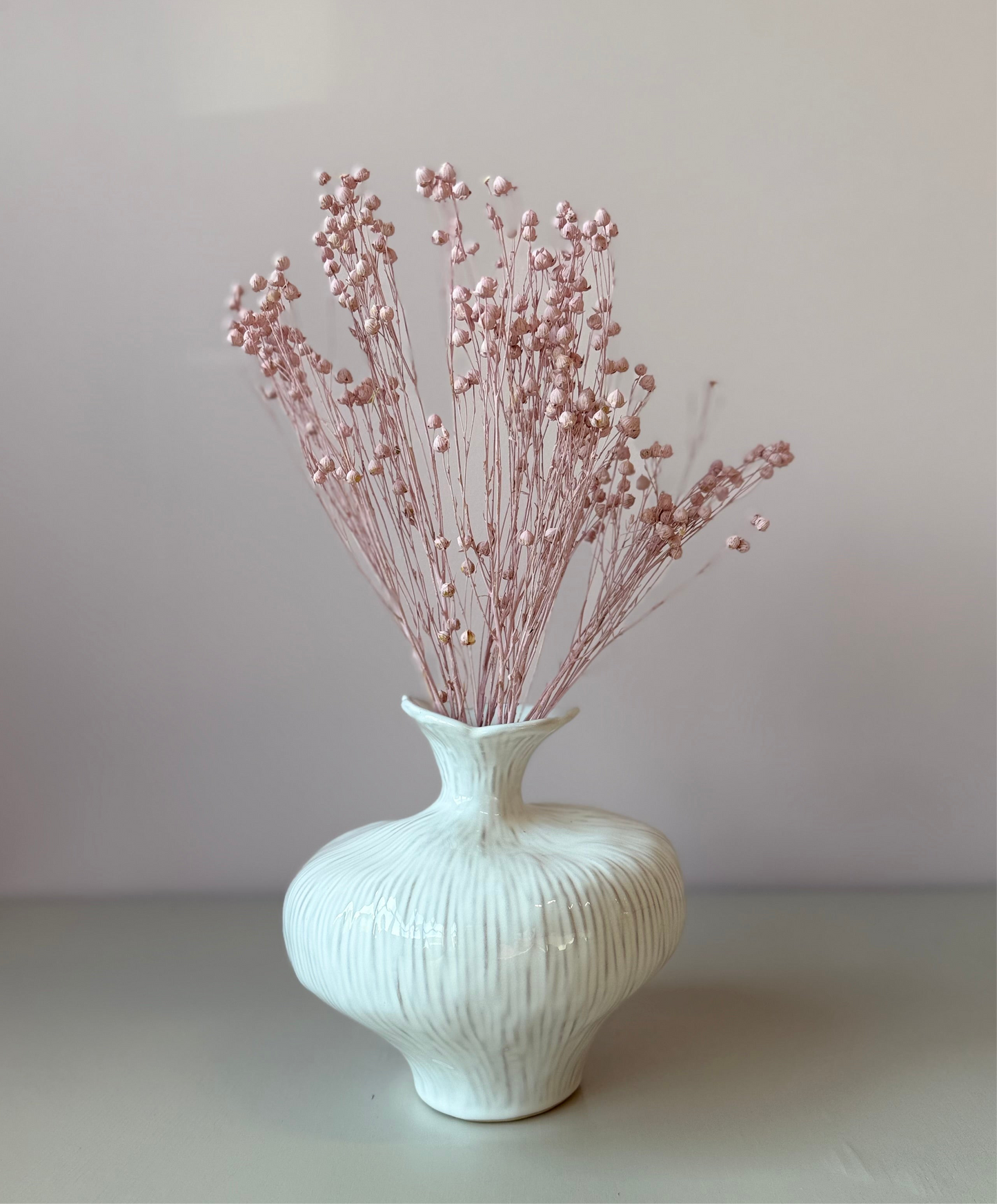 Torkade blommor i bunt.